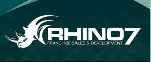 Rhino7 logo featuring a green rhinoceros illustration and black and green lettering with the tagline Franchise Sales & Development.